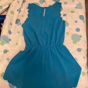 Short romper from brand Everly. Blue and size medium.